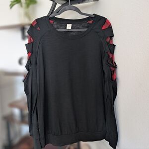 Stylish Black Long Sleeve Top With Red Detail On Sleeve.